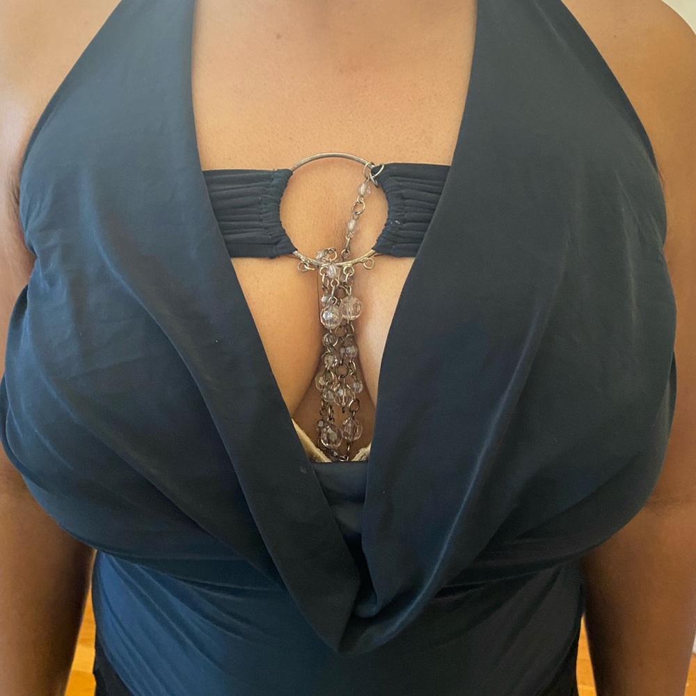 A casual black shirt. Size small/ medium. Very stretchy